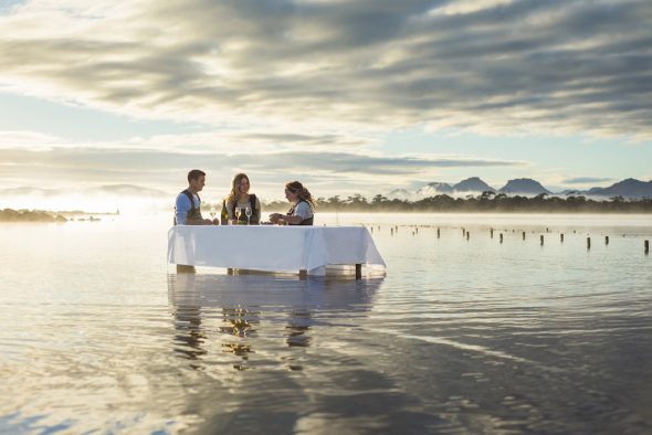 luxury travel dining on the beach